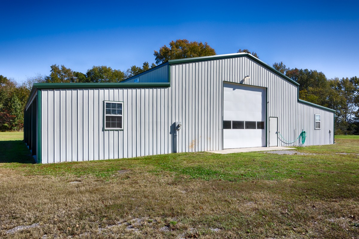 167 Henry Bayless Road Ardmore, TN 38449 - Photo 24 of 30 a view of a house with backyard and trees