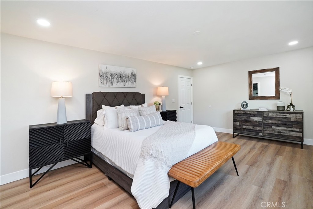 5571 Central Avenue Riverside, CA 92504 - Photo 8 of 21 a bedroom with a bed and a piano
