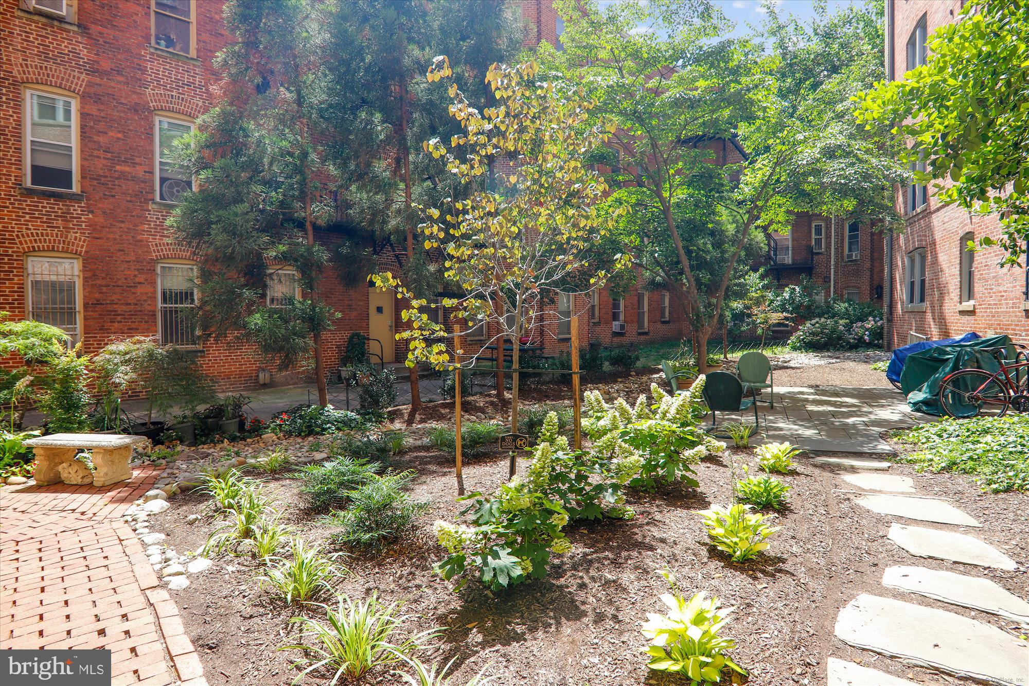 2129 Florida Avenue Northwest, Unit 101 Washington, DC 20008 - Photo 29 of 40 Lush garden oasis in a charming courtyard.