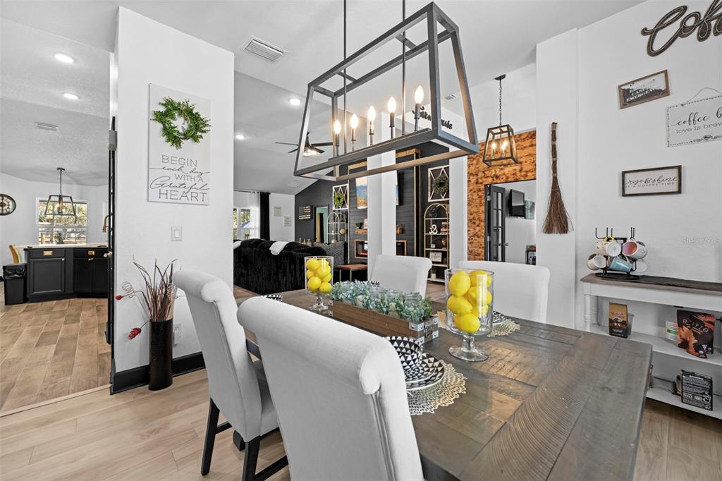 12034 Mandlin Road Weeki Wachee, FL 34614 - Photo 20 of 51 a living room with furniture and wooden floor