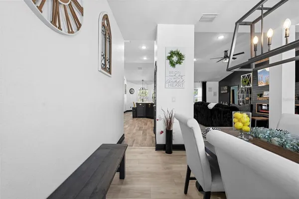 a bed room with furniture and a flat screen tv