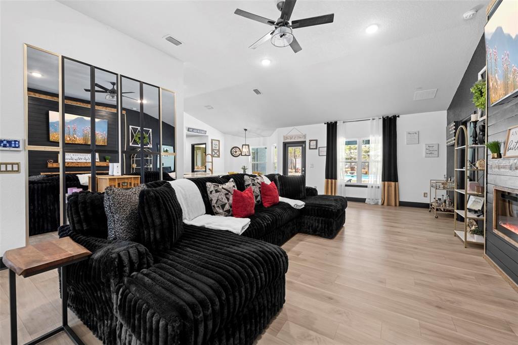 12034 Mandlin Road Weeki Wachee, FL 34614 - Photo 23 of 51 a living room with furniture