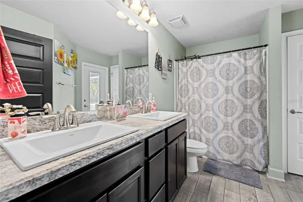 a kitchen with a sink and stove