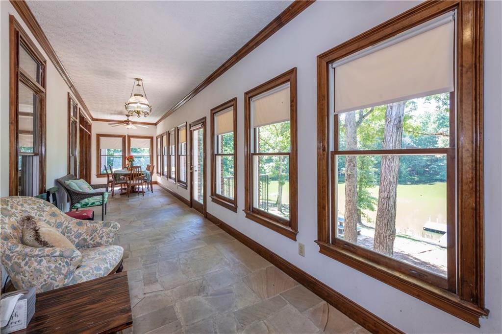 755 Harris Road Jasper, GA 30143 - Photo 28 of 60 a living room with furniture and a large window