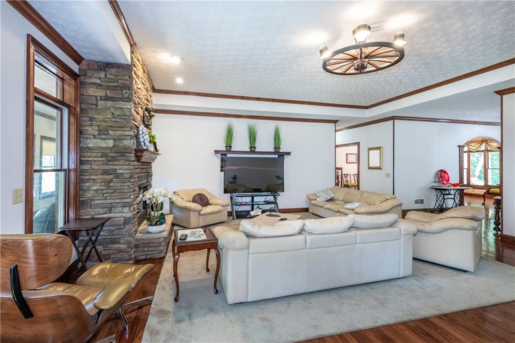 755 Harris Road Jasper, GA 30143 - Photo 30 of 60 a living room with furniture and a flat screen tv