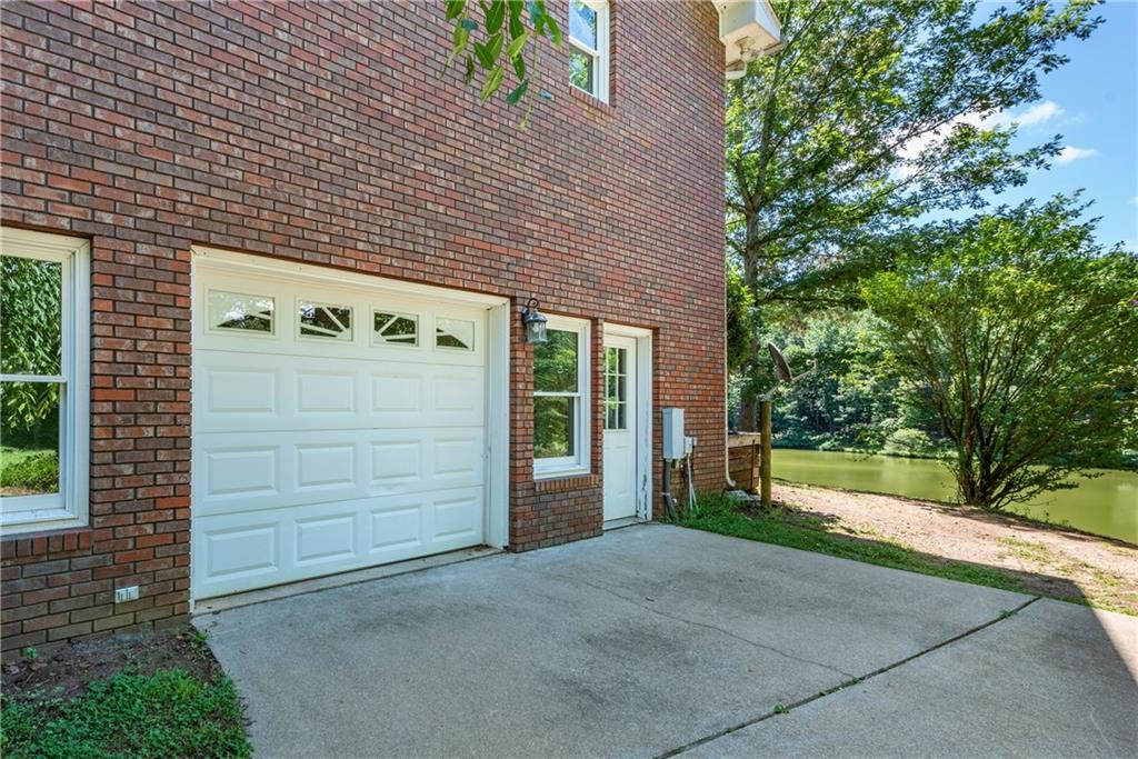 755 Harris Road Jasper, GA 30143 - Photo 43 of 60 a front view of a house with a yard