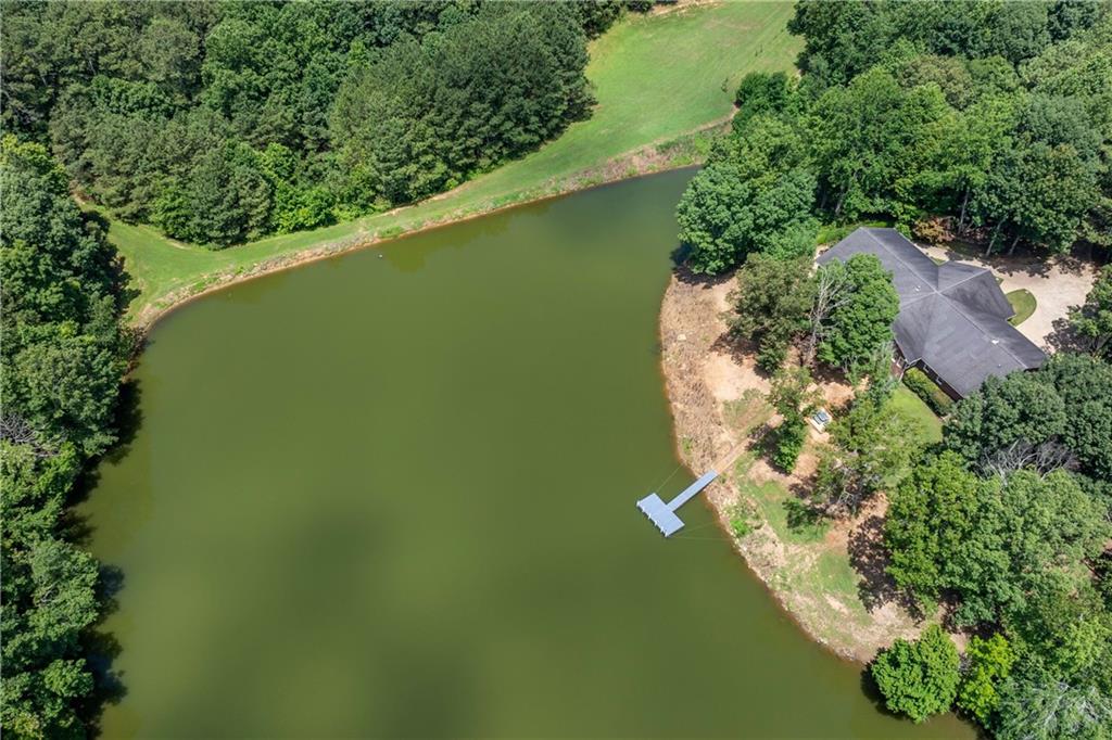 755 Harris Road Jasper, GA 30143 - Photo 55 of 60 an aerial view of a house with a yard and lake view