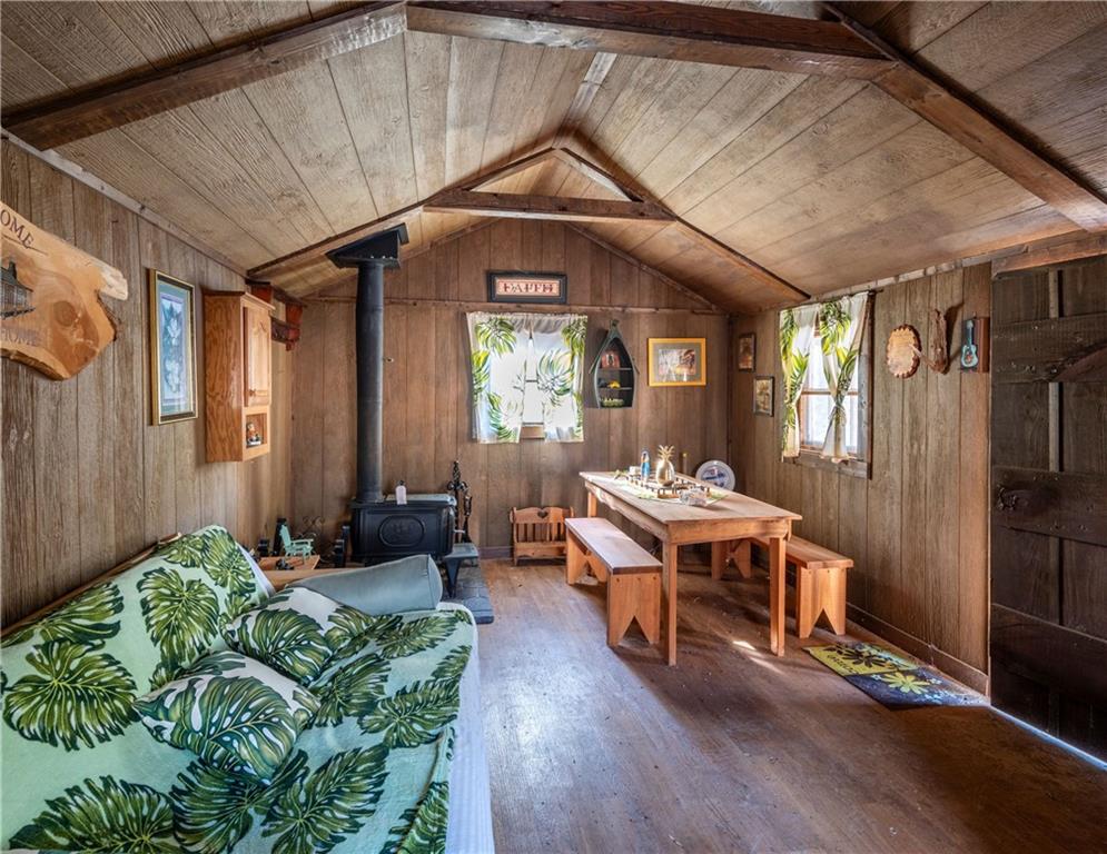 755 Harris Road Jasper, GA 30143 - Photo 58 of 60 a living room with furniture and a chandelier