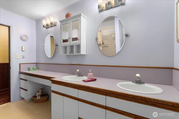 a bed room with a bed and a window