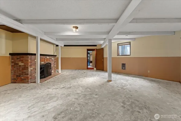 a bedroom with a bed and a view of closet