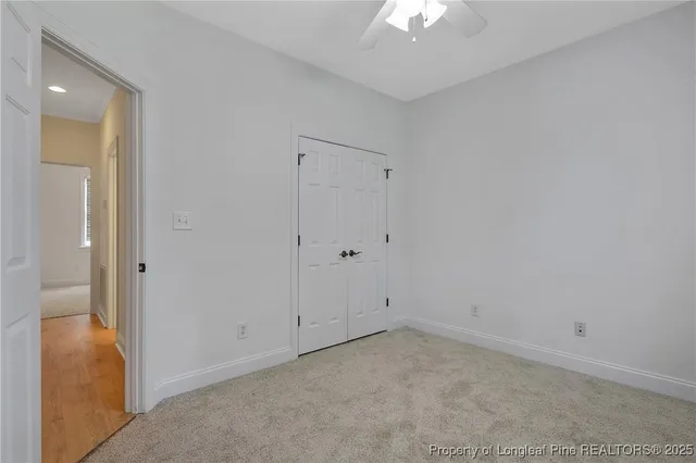a front view of house with yard barbeque and outdoor seating