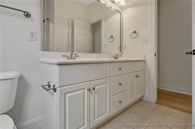 a view of a park with large trees