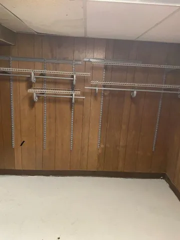 a view of a room with racks on the wall