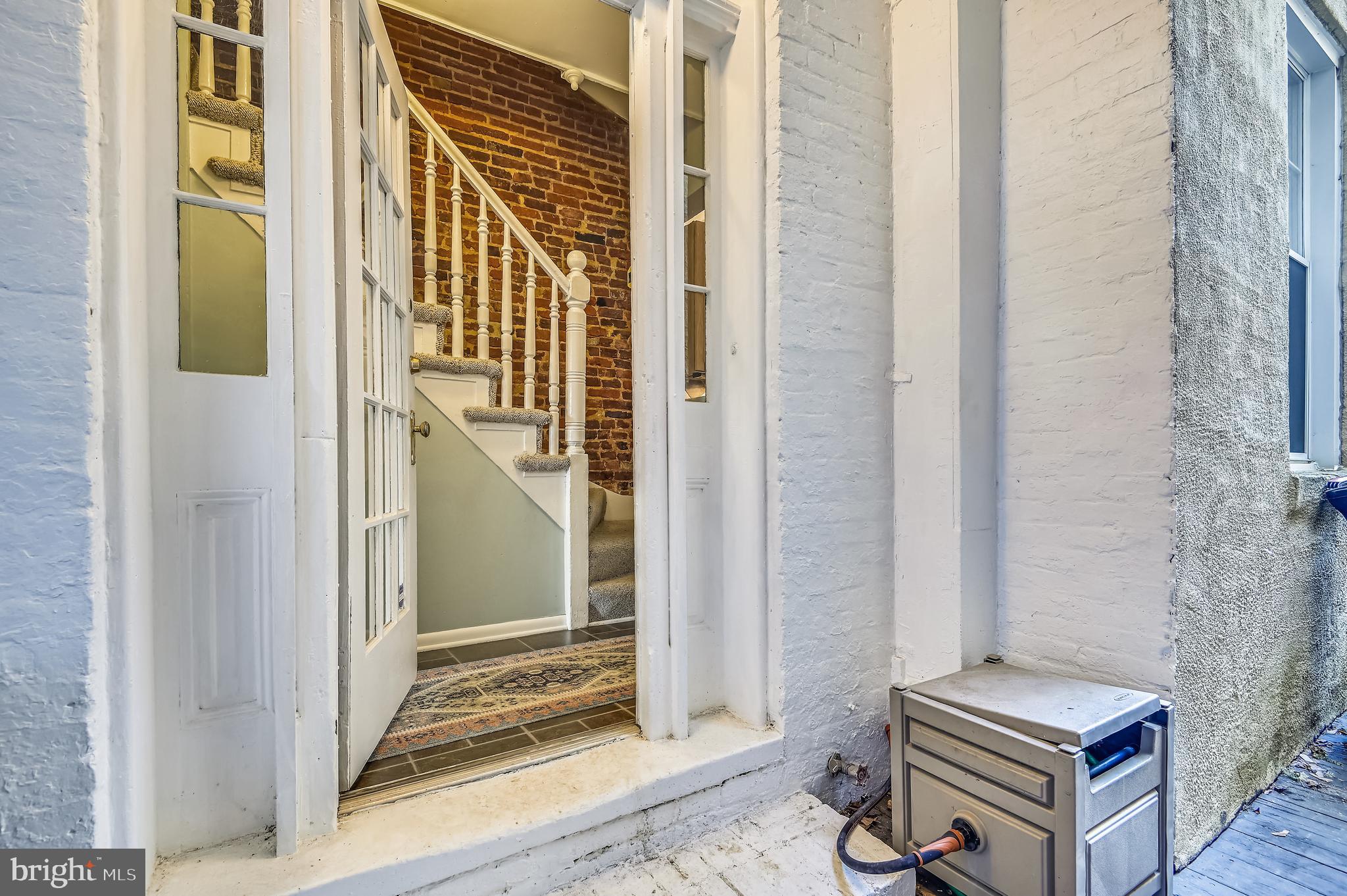 1143 Riverside Avenue Baltimore, MD 21230 - Photo 13 of 76 Side entry out to breezeway
