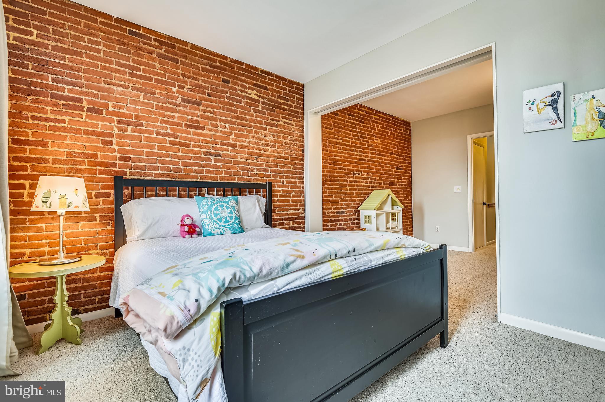 1143 Riverside Avenue Baltimore, MD 21230 - Photo 34 of 76 Large Bedroom (2) with brick walls