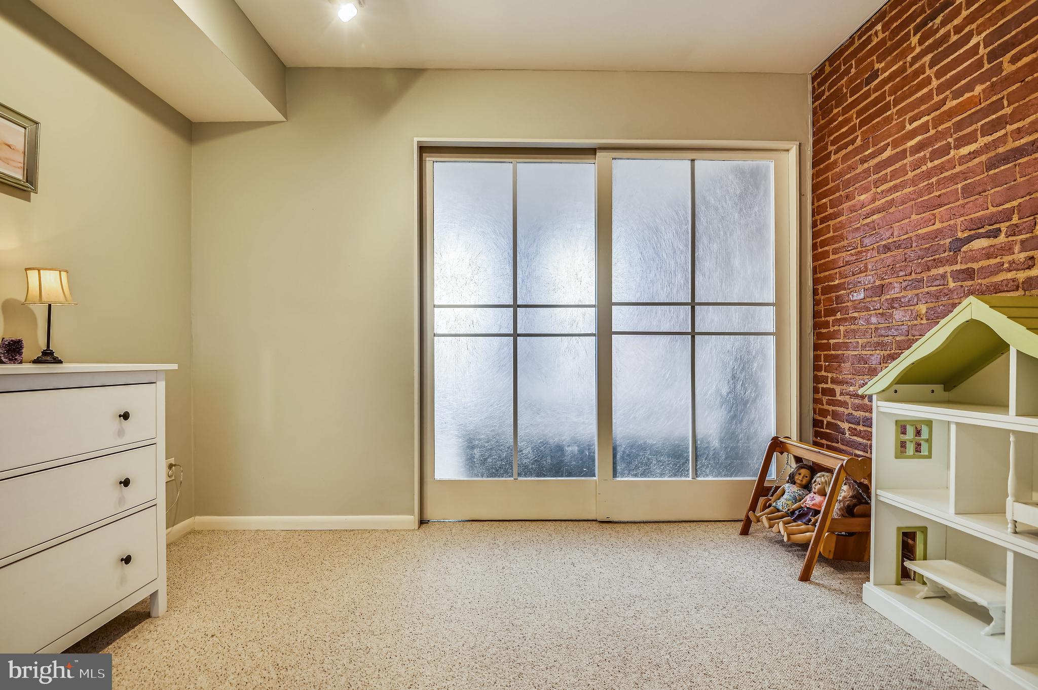 1143 Riverside Avenue Baltimore, MD 21230 - Photo 36 of 76 Large Bedroom (2) with brick walls