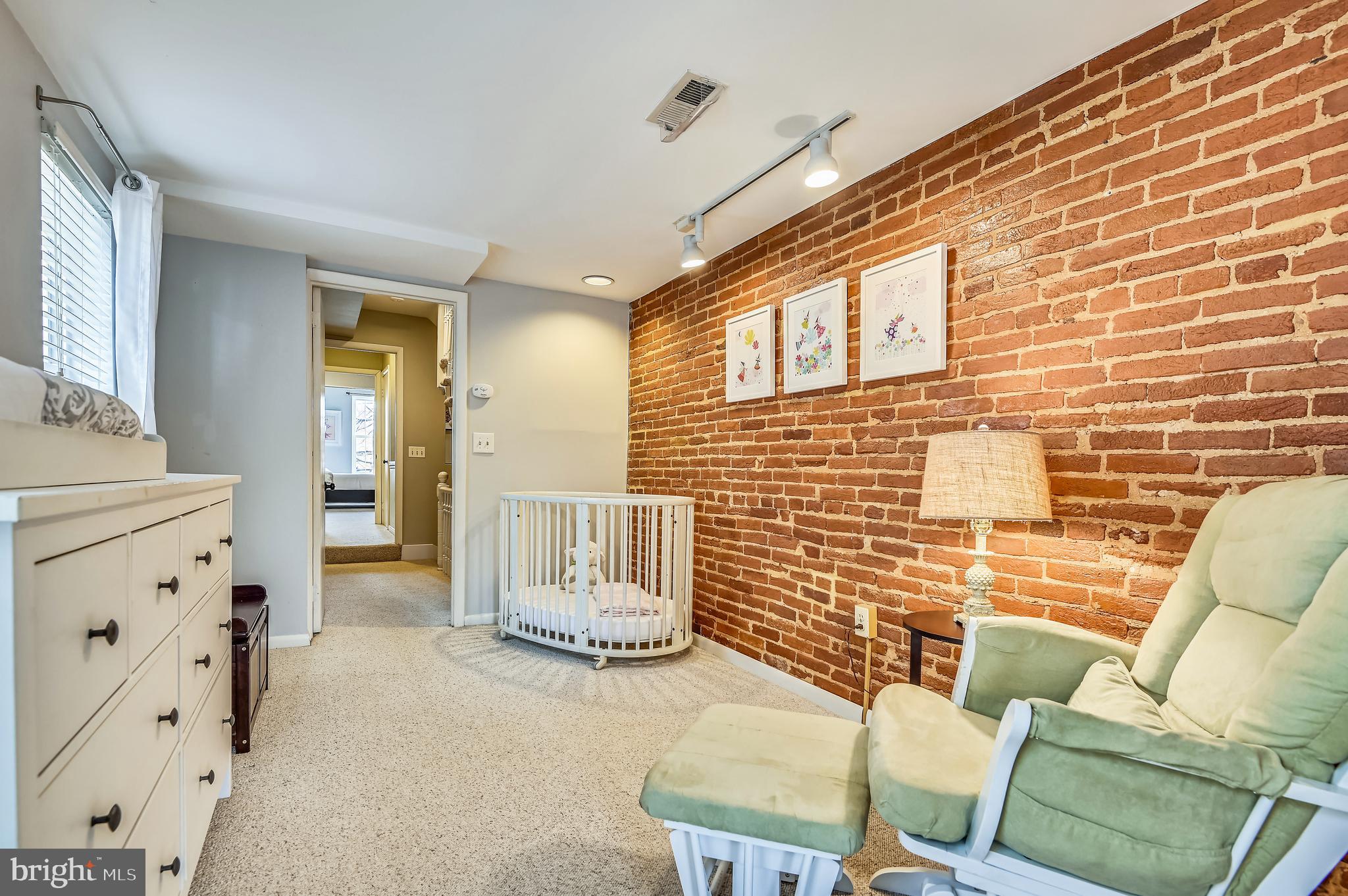 1143 Riverside Avenue Baltimore, MD 21230 - Photo 40 of 76 Bedroom 3 with brick walls and loads of light