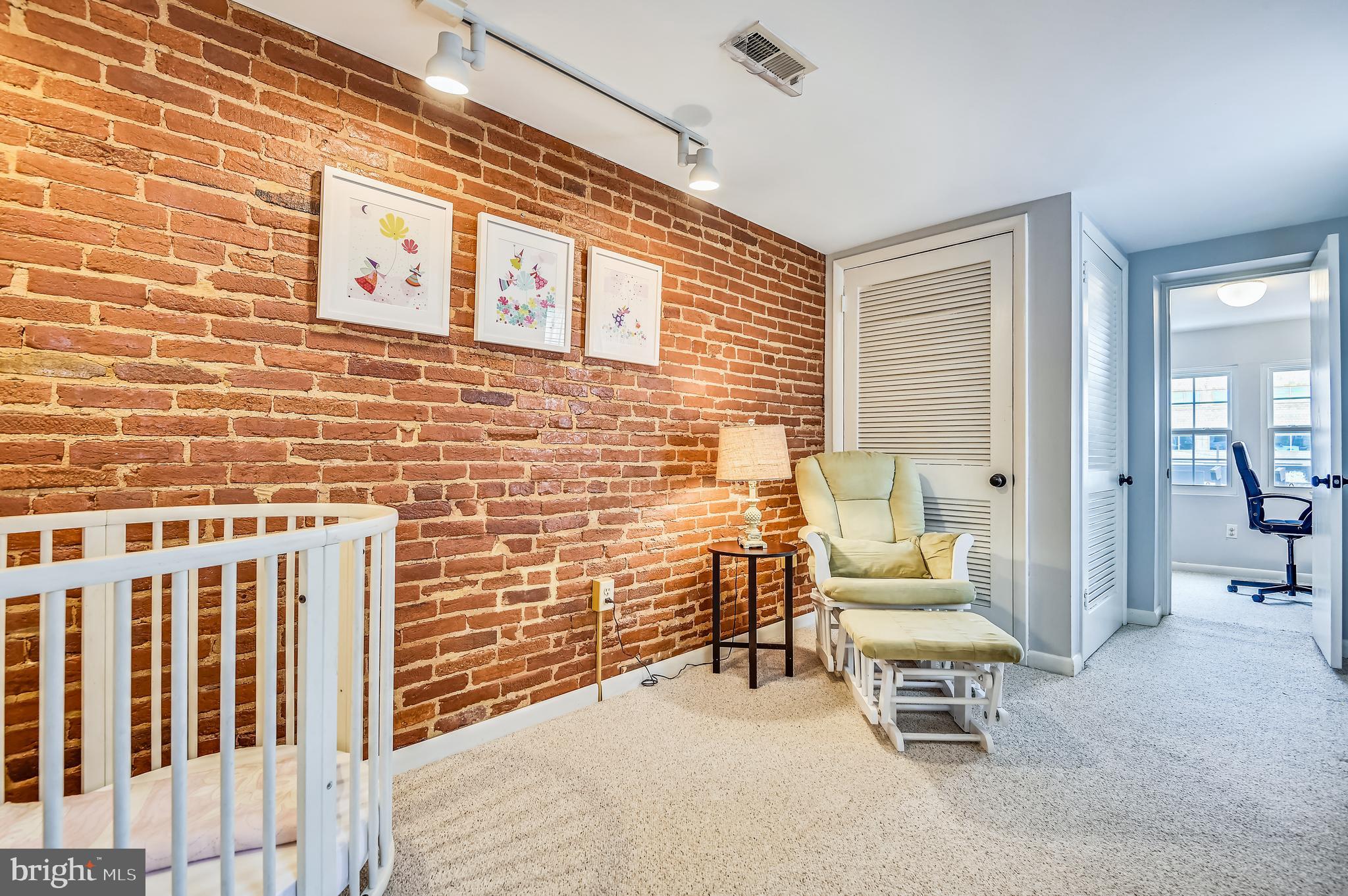 1143 Riverside Avenue Baltimore, MD 21230 - Photo 42 of 76 Bedroom 3 with brick walls and loads of light