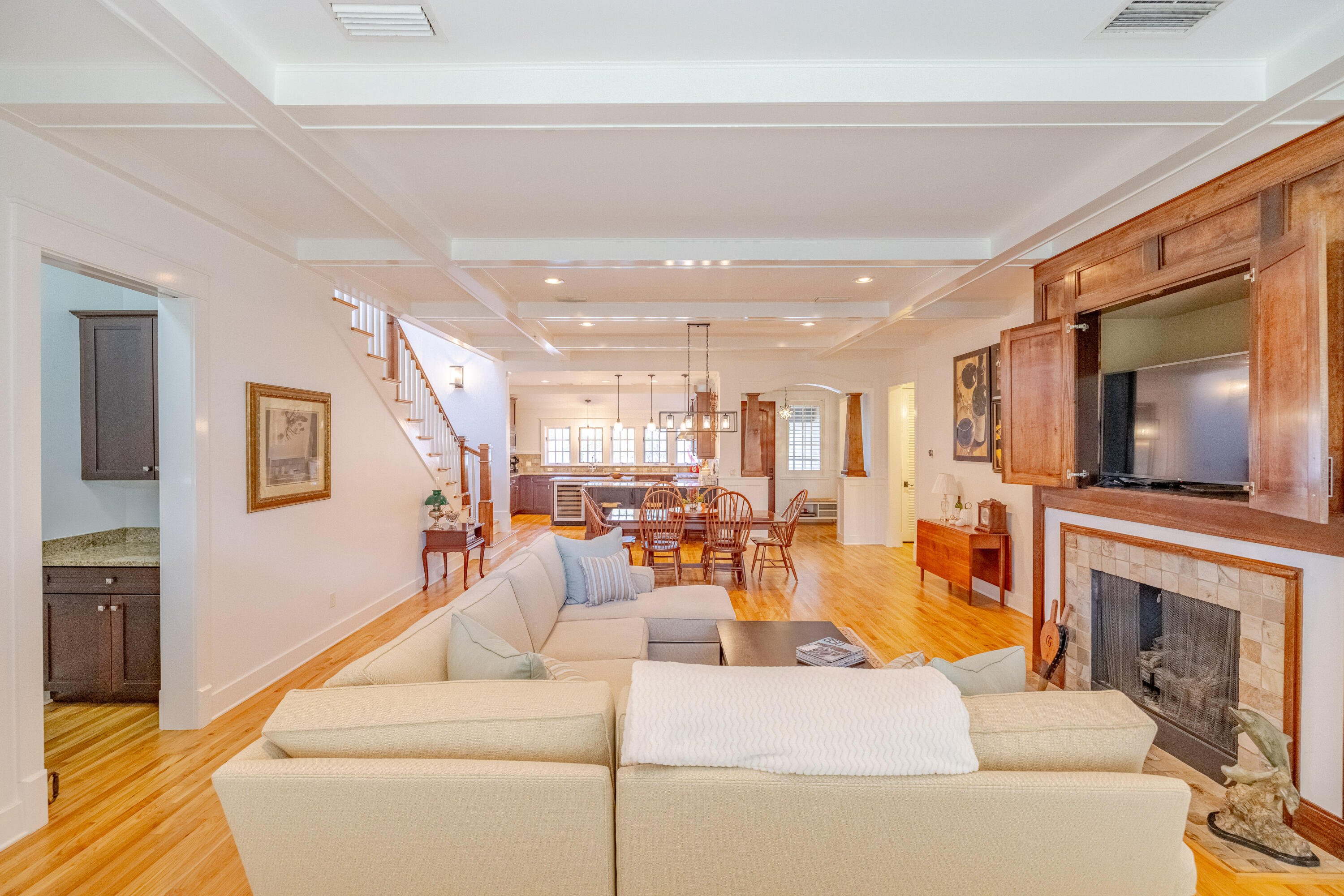 1508 Match Point Lane, Unit 302 Panama City Beach, FL 32413 - Photo 13 of 76 a living room with furniture and a fireplace