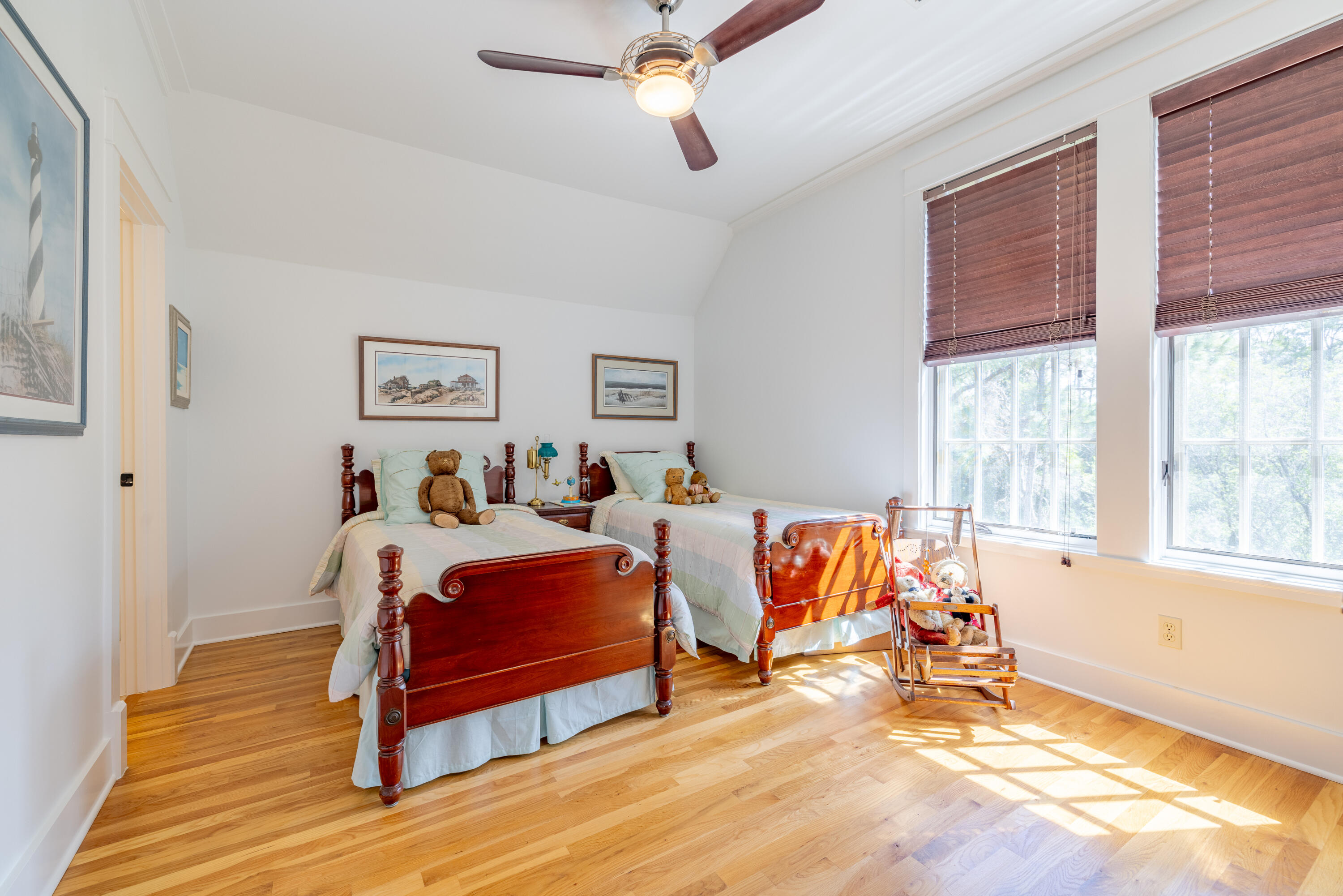 1508 Match Point Lane, Unit 302 Panama City Beach, FL 32413 - Photo 39 of 76 a spacious bedroom with a bed and a window