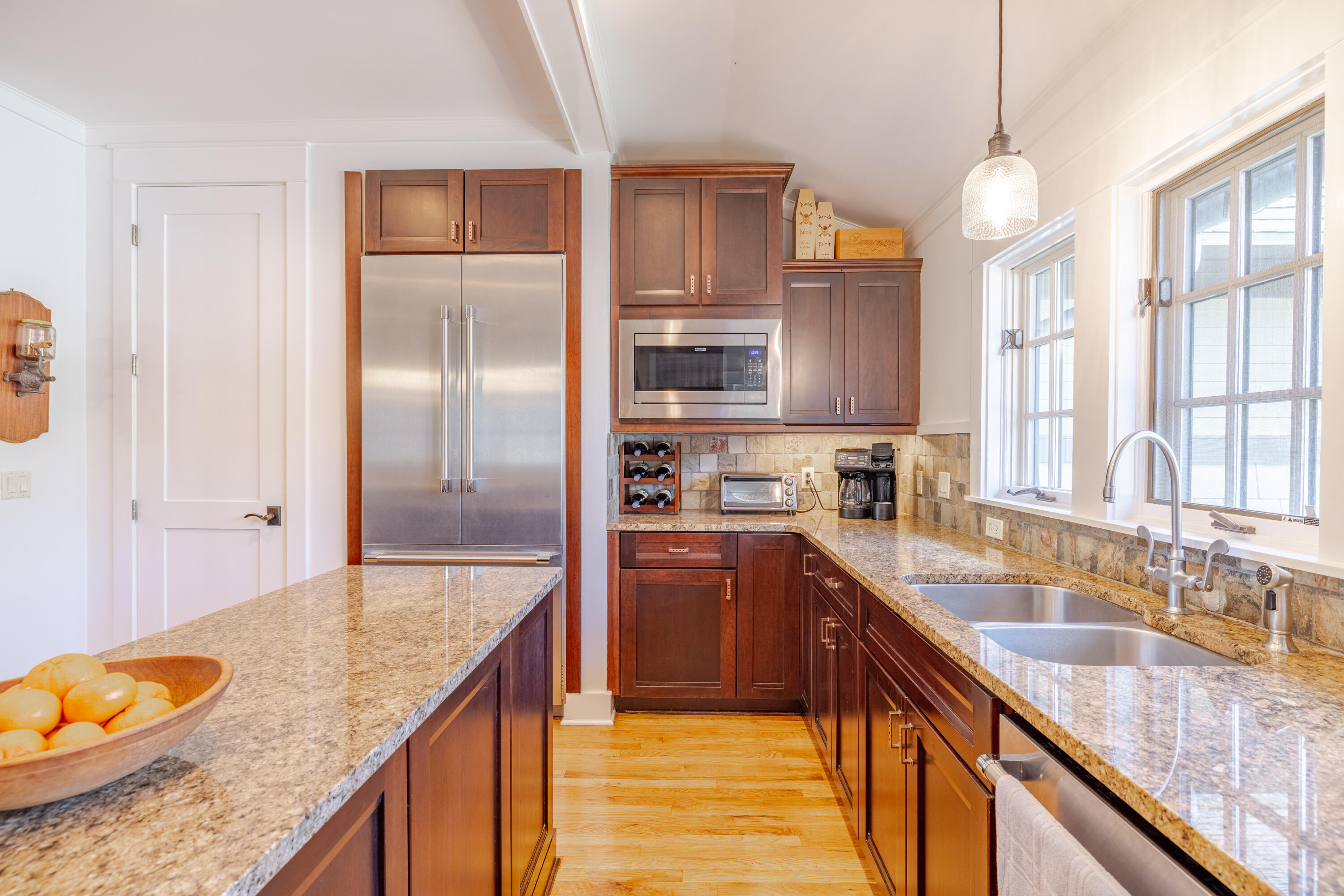 1508 Match Point Lane, Unit 302 Panama City Beach, FL 32413 - Photo 6 of 76 a kitchen with stainless steel appliances granite countertop a sink refrigerator and cabinets