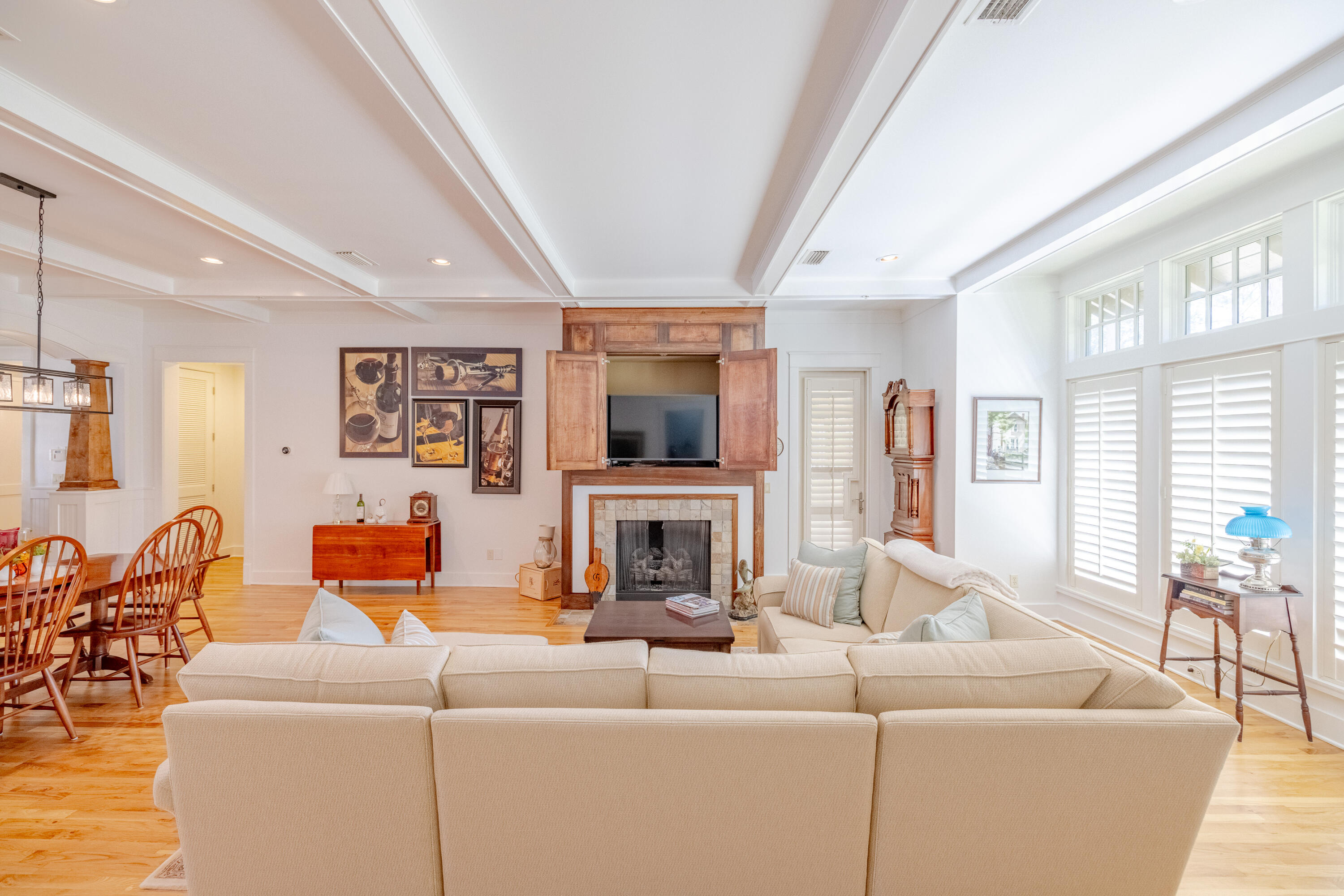 1508 Match Point Lane, Unit 302 Panama City Beach, FL 32413 - Photo 9 of 76 a living room with furniture and a fireplace