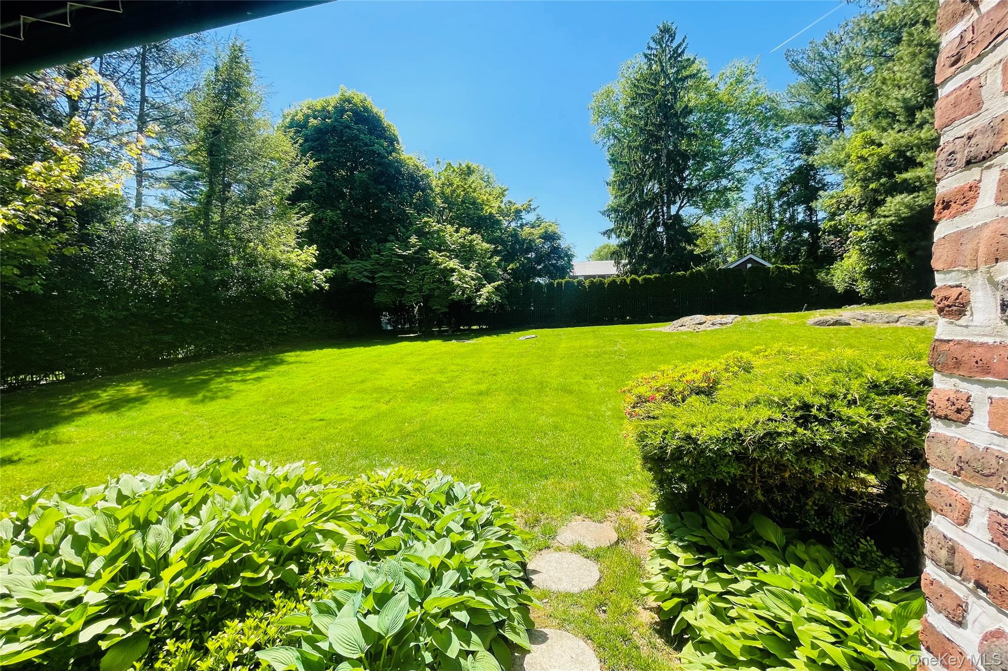 44 Fenimore Road New Rochelle, NY 10804 - Photo 38 of 46 a view of a garden with plants