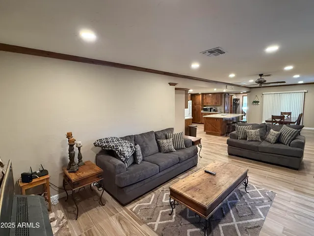 a living room with furniture and a couch