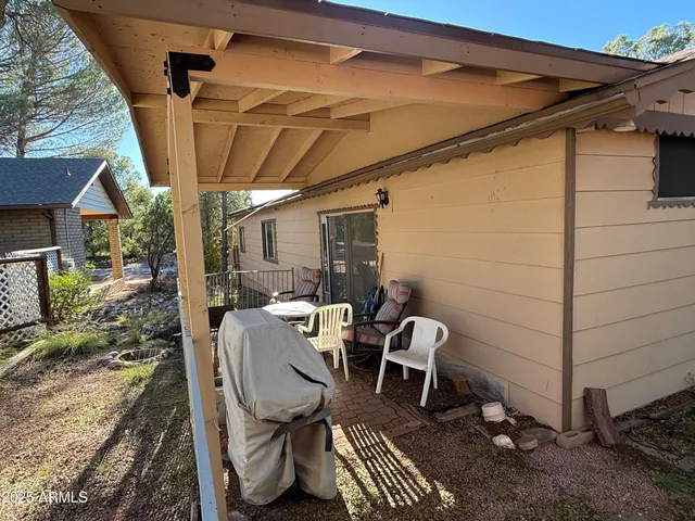 a view of a back yard of the house