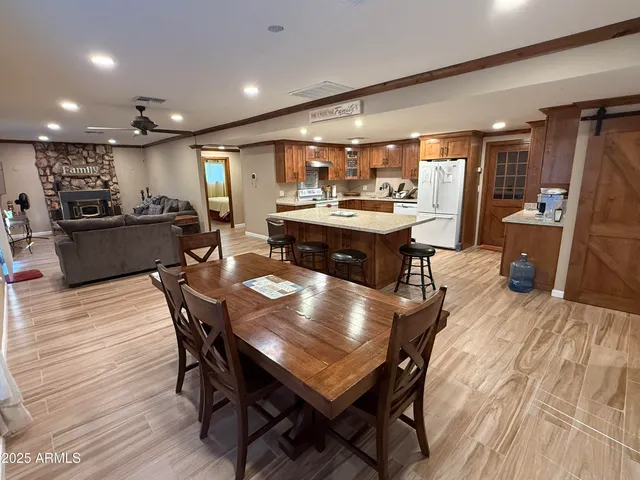 a view of a dining room with furniture