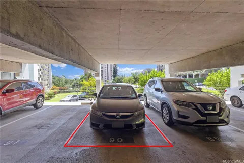 a room with furniture parked window and a table