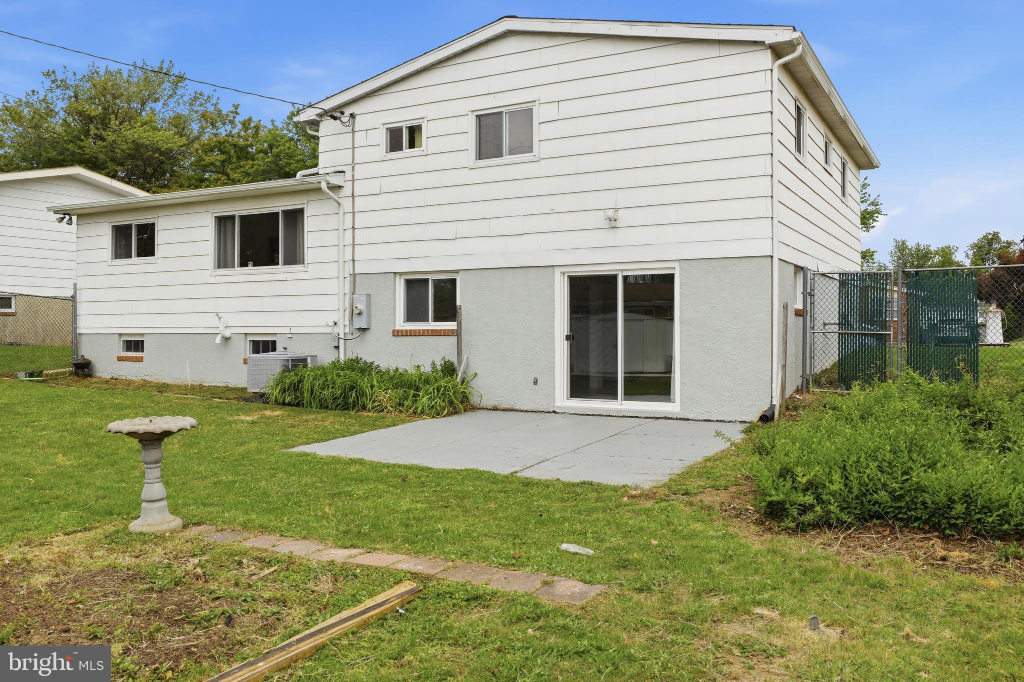 7434 Prince George Road Baltimore, MD 21208 - Photo 26 of 30 Refinished back patio, yard is great for hosting!