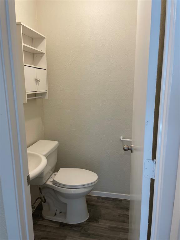 3522 Jewel Street Sachse, TX 75048 - Photo 12 of 18 a white toilet sitting next to a shower