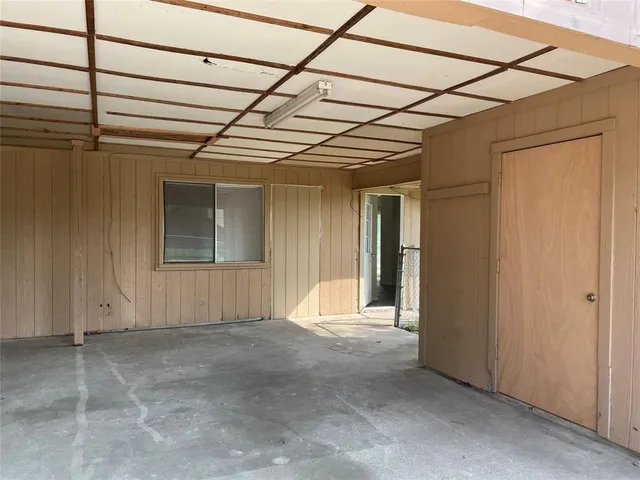 a view of a room with a garage