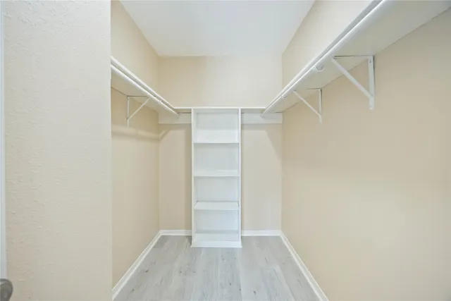 a view of an empty walk in closet