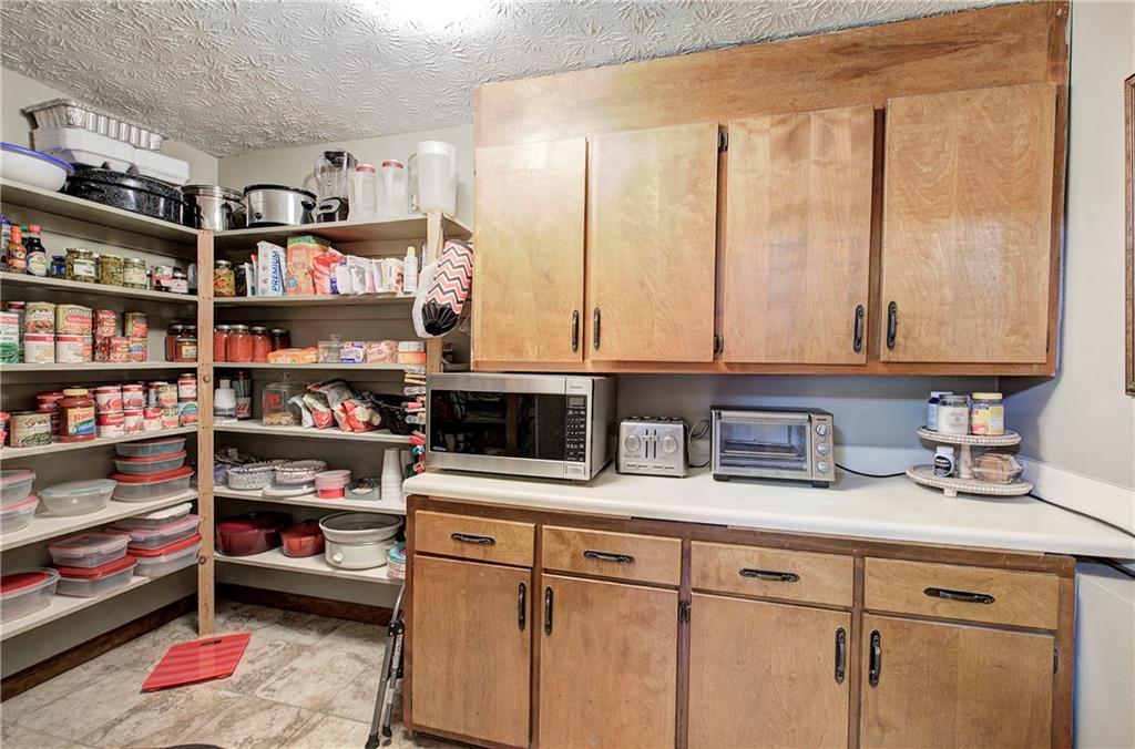3637 Nebo Road Hiram, GA 30141 - Photo 23 of 63 a view of storage and utility room with racks