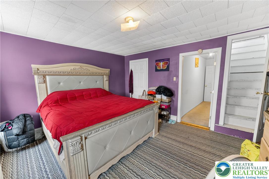 308 State Street Bethlehem, PA 18015 - Photo 18 of 30 a bed room with a bed and a dresser
