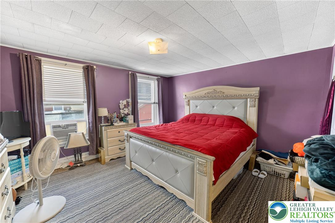 308 State Street Bethlehem, PA 18015 - Photo 19 of 30 a bed room with a bed and a chair