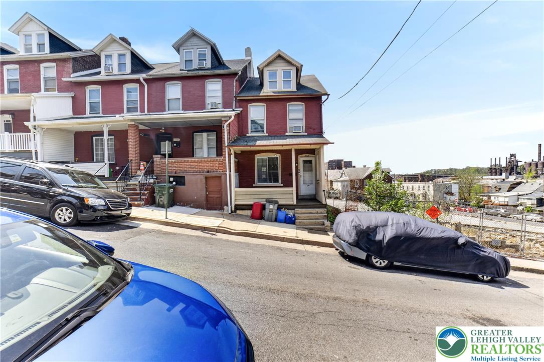 308 State Street Bethlehem, PA 18015 - Photo 2 of 30 a view of a car park in front of a brick house