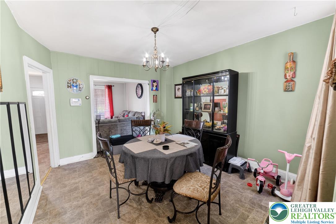 308 State Street Bethlehem, PA 18015 - Photo 7 of 30 a view of a dining room with furniture and a chandelier