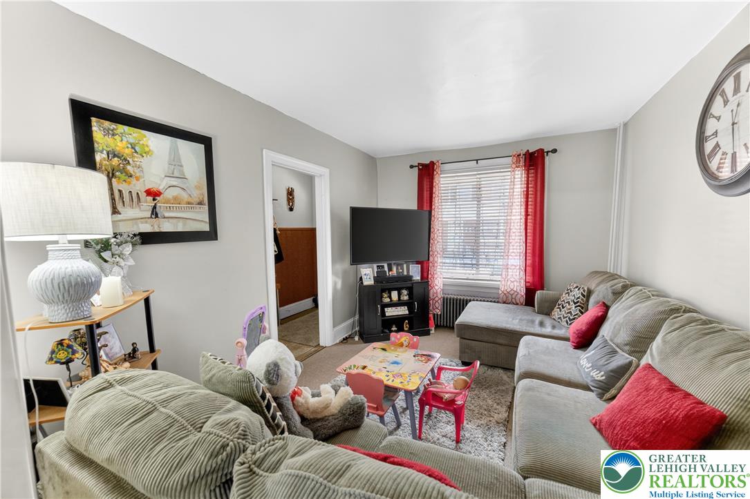 308 State Street Bethlehem, PA 18015 - Photo 8 of 30 a living room with furniture and a flat screen tv