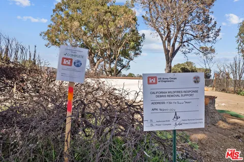 a view of a sign in a yard