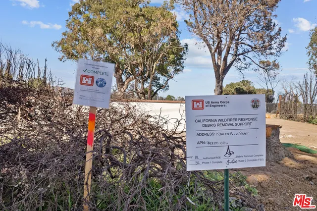a view of a sign in a yard