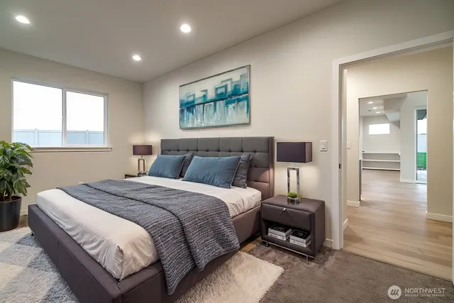 a bedroom with furniture and a fireplace