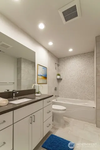 a view of a livingroom and a hallway