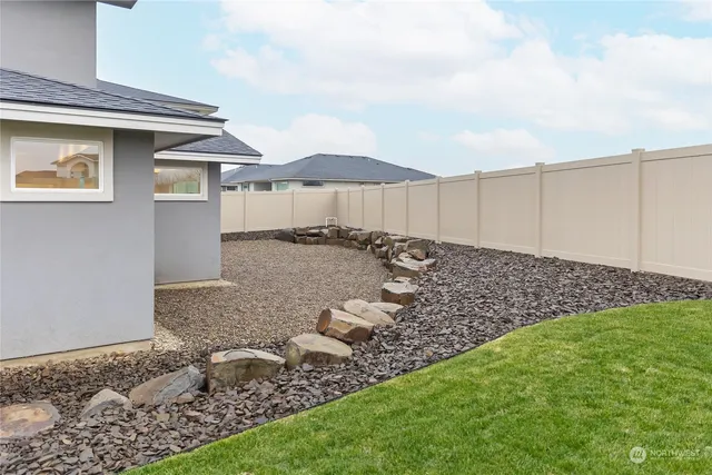 a front view of a house with yard