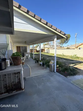a view of a porch with furniture