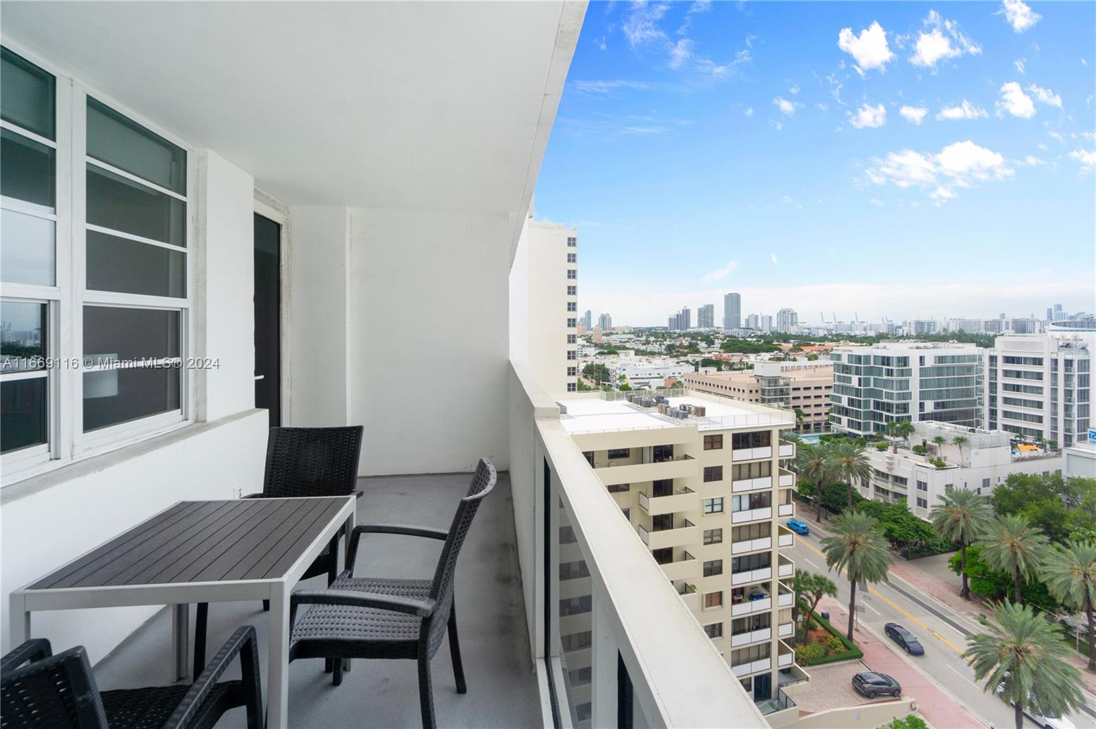 100 Lincoln Road, Unit 1418 Miami Beach, FL 33139 - Photo 13 of 18 a view of a terrace with chairs
