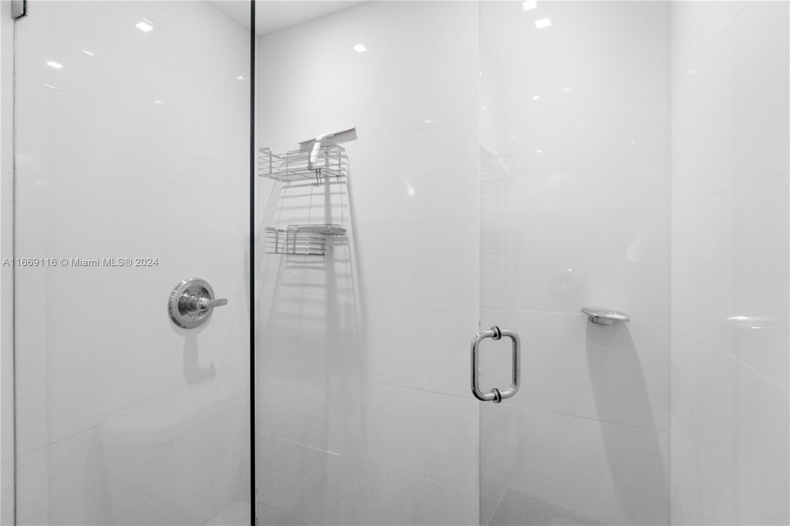 100 Lincoln Road, Unit 1418 Miami Beach, FL 33139 - Photo 10 of 18 a bathroom with a shower