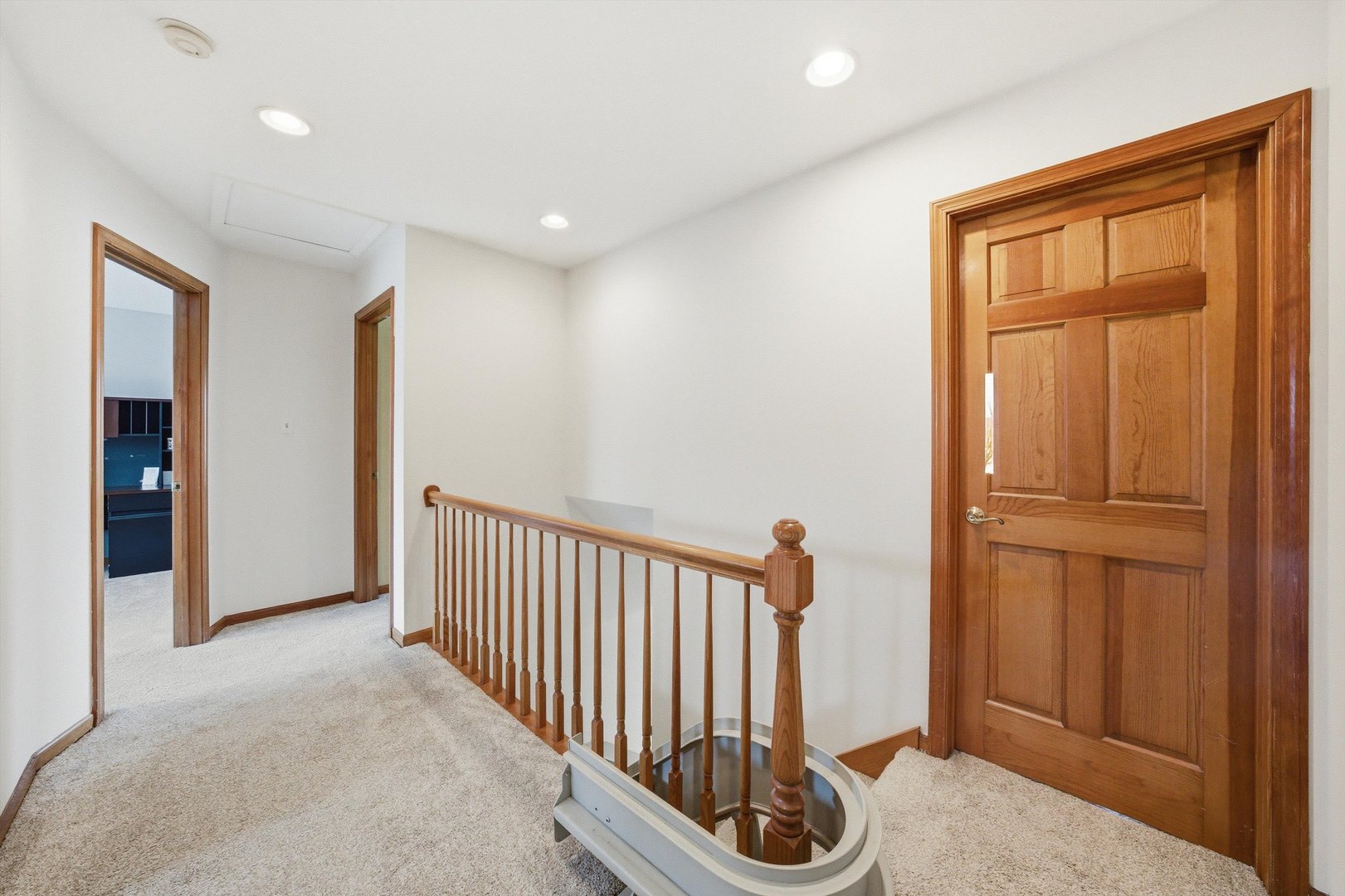 18 Newgate Avenue Naperville, IL 60565 - Photo 14 of 29 a view of a hallway with closet area